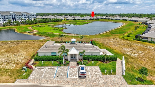 aerial perspective of suburban area featuring a large body of water