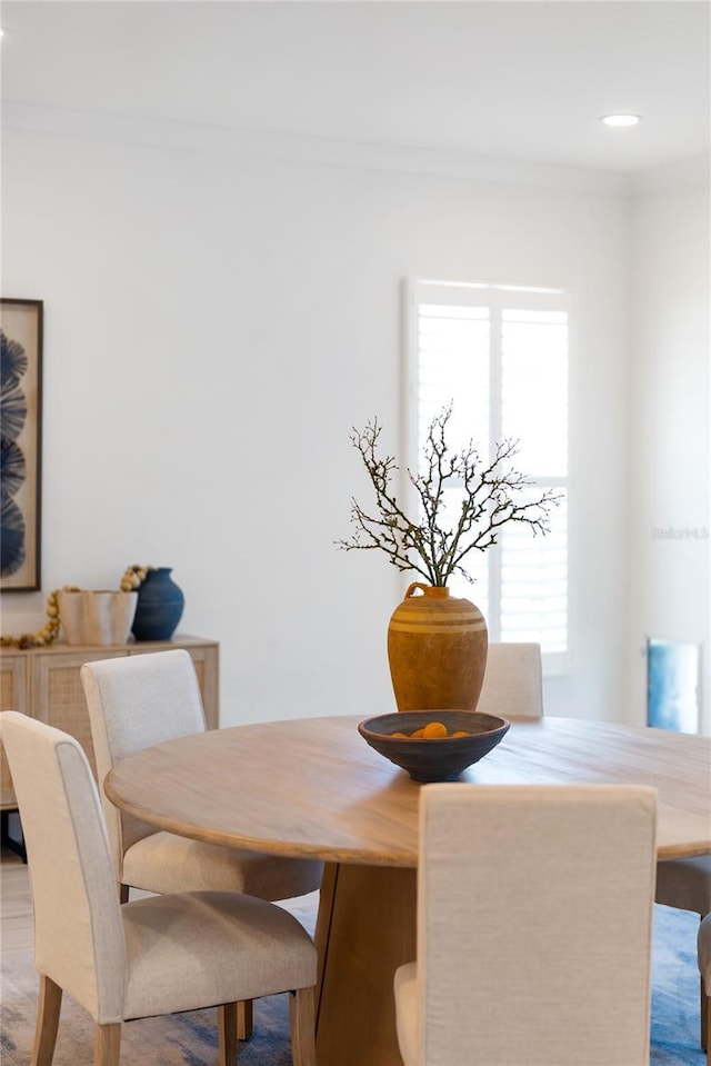 dining room featuring recessed lighting