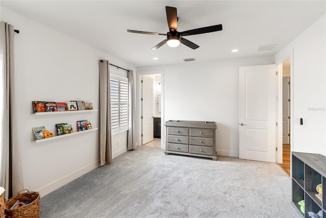 unfurnished bedroom with carpet floors, baseboards, recessed lighting, ceiling fan, and ensuite bath