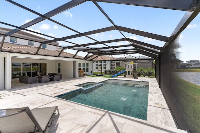 view of swimming pool featuring outdoor lounge area, a patio, a pool with connected hot tub, a playground, and glass enclosure