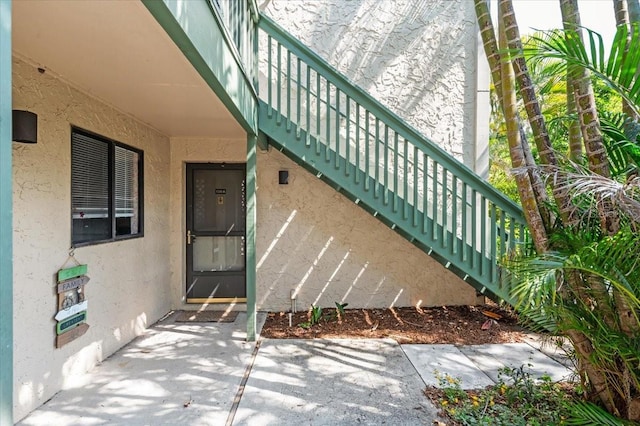 1629 Pelican Cove Rd Unit 138A, Sarasota, FL 34231 - property entrance featuring stucco siding
