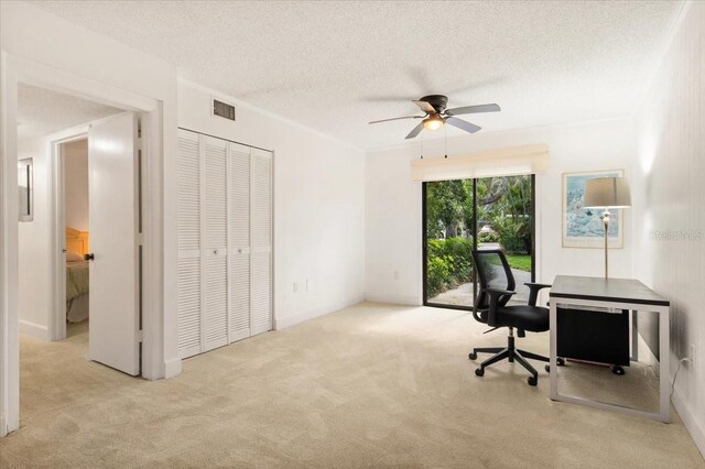 1629 Pelican Cove Rd Unit 138A, Sarasota, FL 34231 - carpeted office space with ceiling fan and a textured ceiling