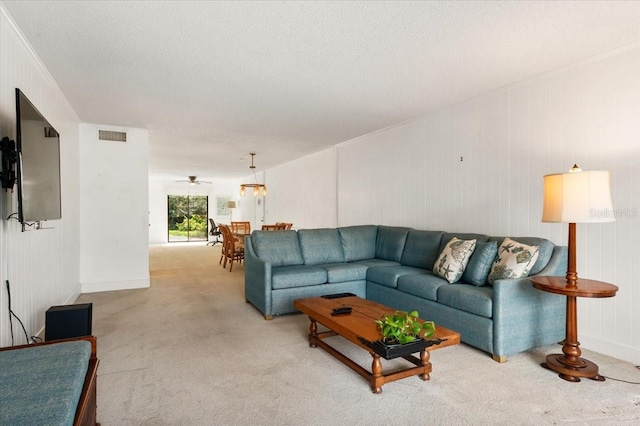 1629 Pelican Cove Rd Unit 138A, Sarasota, FL 34231 - living room with carpet flooring and a ceiling fan