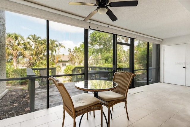1629 Pelican Cove Rd Unit 138A, Sarasota, FL 34231 - sunroom / solarium featuring a ceiling fan and plenty of natural light