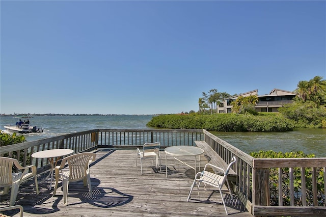 1629 Pelican Cove Rd Unit 138A, Sarasota, FL 34231 - deck featuring a water view