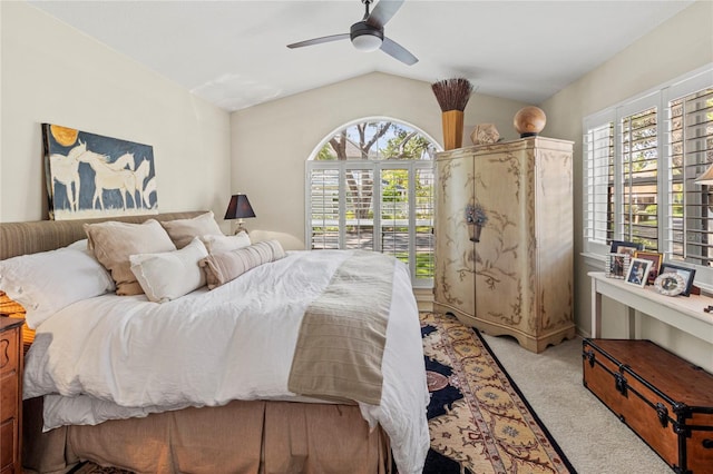 6402 23rd Avenue Dr W, Bradenton, FL 34209 - carpeted bedroom with vaulted ceiling, ceiling fan, and access to outside