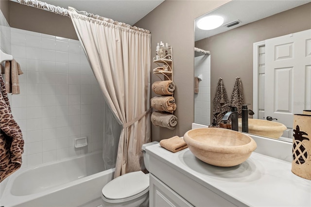 6402 23rd Avenue Dr W, Bradenton, FL 34209 - full bathroom featuring shower / tub combo with curtain, toilet, and vanity
