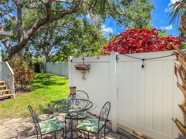 6402 23rd Avenue Dr W, Bradenton, FL 34209 - view of patio featuring stairs