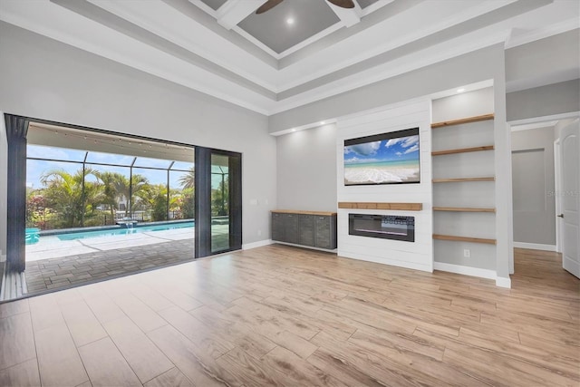 4312 Vasco St, Punta Gorda, FL 33950 - unfurnished living room featuring a high ceiling, a ceiling fan, baseboards, wood finished floors, and crown molding