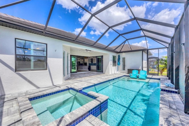 4312 Vasco St, Punta Gorda, FL 33950 - view of pool featuring a patio, a pool with connected hot tub, ceiling fan, and glass enclosure