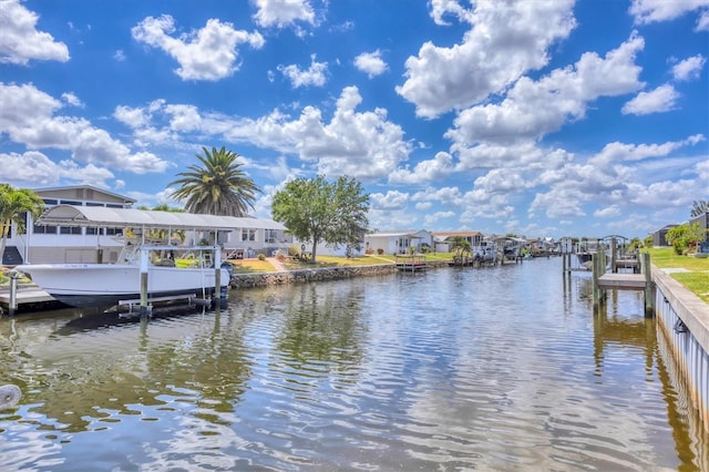 4312 Vasco St, Punta Gorda, FL 33950 - dock area featuring boat lift, a water view, and a residential view
