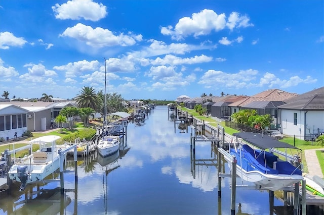 4312 Vasco St, Punta Gorda, FL 33950 - dock with boat lift, a water view, and a residential view