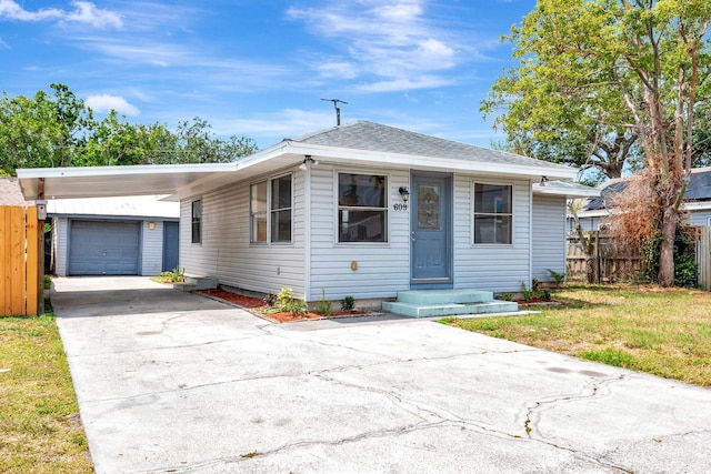 bungalow with driveway and a garage