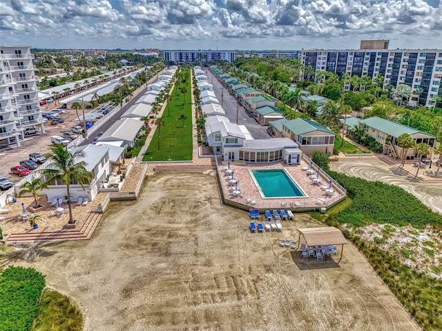 drone / aerial view of a pool area