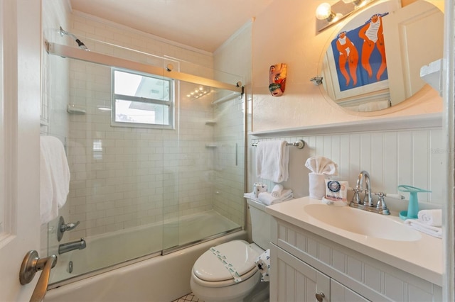 205 71st St Unit B, Holmes Beach, FL 34217 - full bathroom featuring toilet, enclosed tub / shower combo, vanity, a wainscoted wall, and crown molding