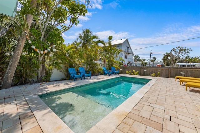 205 71st St Unit B, Holmes Beach, FL 34217 - view of swimming pool with a patio area and a fenced backyard