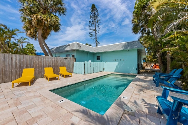 205 71st St Unit B, Holmes Beach, FL 34217 - view of pool featuring a patio and a fenced backyard