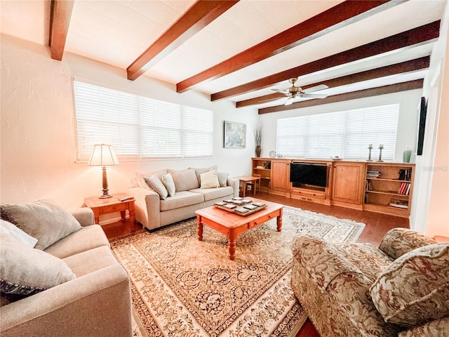 living room with beam ceiling, ceiling fan, and wood finished floors