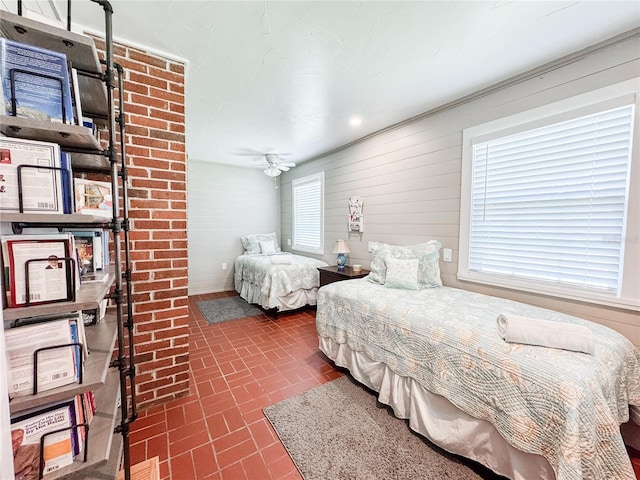 bedroom featuring brick patterned flooring