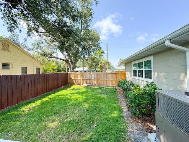 view of yard with central AC