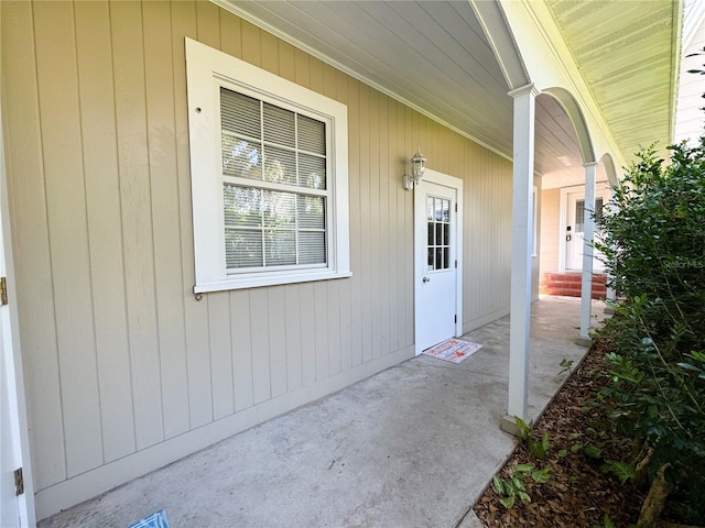 property entrance with a porch