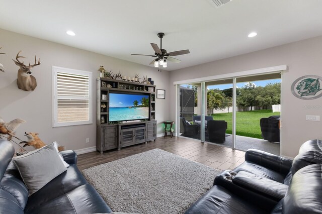 11513 11th Ave E, Bradenton, FL 34212 - living area featuring ceiling fan, recessed lighting, wood finished floors, and baseboards