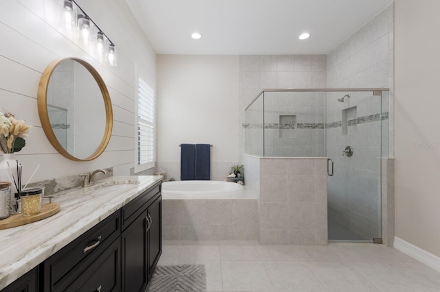 11513 11th Ave E, Bradenton, FL 34212 - full bath with tile patterned floors, a bath, vanity, a stall shower, and recessed lighting
