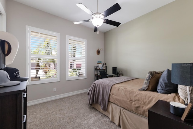 11513 11th Ave E, Bradenton, FL 34212 - carpeted bedroom with baseboards and ceiling fan