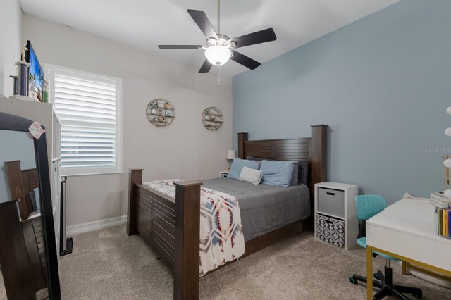 11513 11th Ave E, Bradenton, FL 34212 - bedroom featuring light colored carpet and a ceiling fan