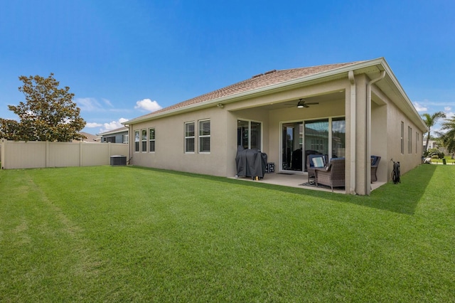 11513 11th Ave E, Bradenton, FL 34212 - back of property featuring a ceiling fan, stucco siding, and a patio area