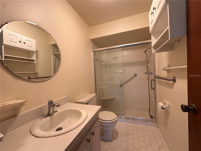 1214 56th St W Unit 1214, Bradenton, FL 34209 - bathroom featuring tile patterned floors, toilet, a stall shower, and vanity