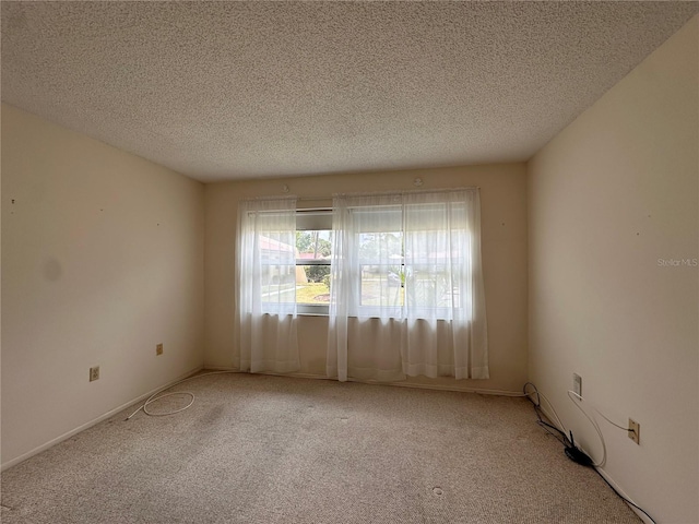 1214 56th St W Unit 1214, Bradenton, FL 34209 - spare room with carpet and a textured ceiling
