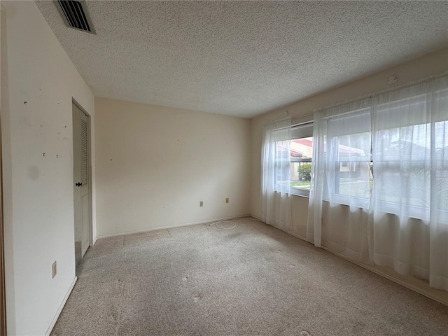 1214 56th St W Unit 1214, Bradenton, FL 34209 - unfurnished room featuring carpet floors and a textured ceiling