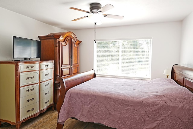 802 Capri Isles Blvd Unit 231, Venice, FL 34292 - bedroom with wood finished floors and ceiling fan