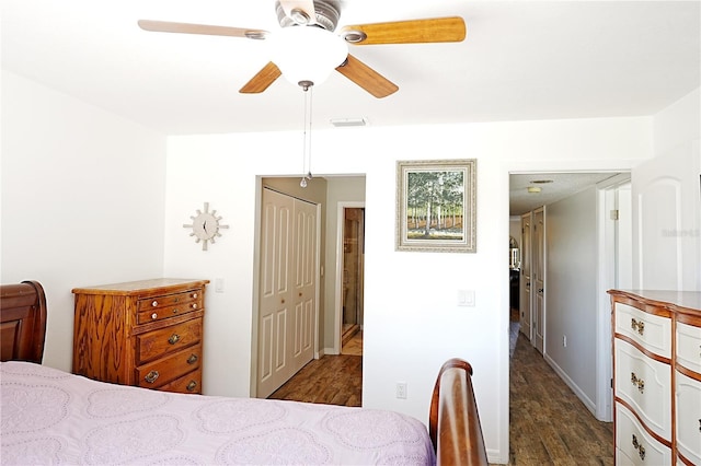 802 Capri Isles Blvd Unit 231, Venice, FL 34292 - bedroom with dark wood-type flooring and ceiling fan