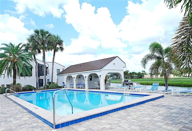 802 Capri Isles Blvd Unit 231, Venice, FL 34292 - community pool featuring a patio area