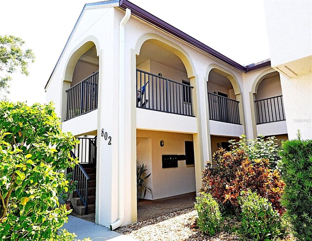802 Capri Isles Blvd Unit 231, Venice, FL 34292 - view of building exterior with stairs