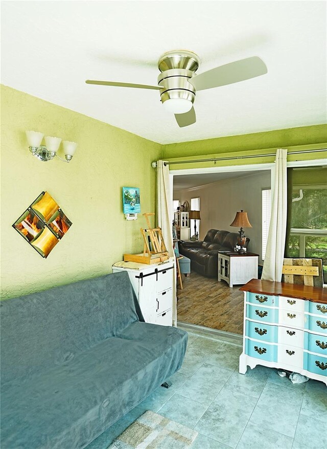802 Capri Isles Blvd Unit 231, Venice, FL 34292 - living room featuring a ceiling fan