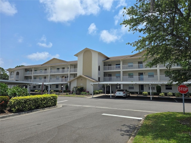 7201 29th Avenue Dr W Unit 306, Bradenton, FL 34209 - view of building exterior with covered and uncovered parking