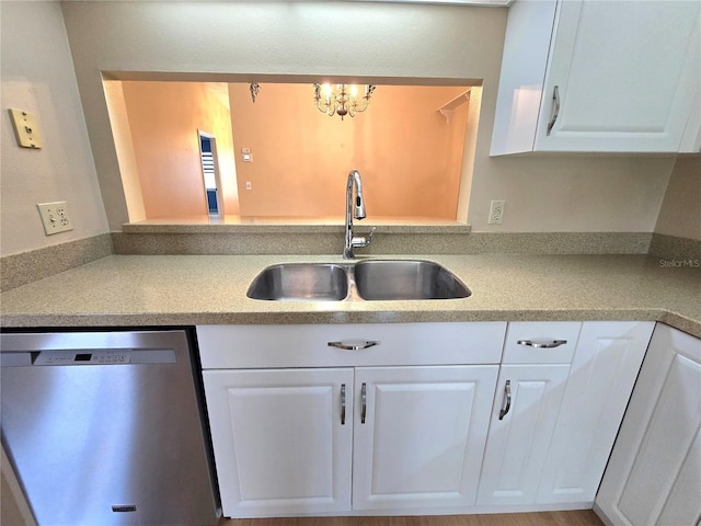7201 29th Avenue Dr W Unit 306, Bradenton, FL 34209 - kitchen featuring dishwasher, a sink, white cabinetry, and light countertops