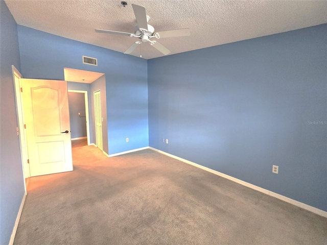 7201 29th Avenue Dr W Unit 306, Bradenton, FL 34209 - carpeted spare room featuring ceiling fan, baseboards, and a textured ceiling