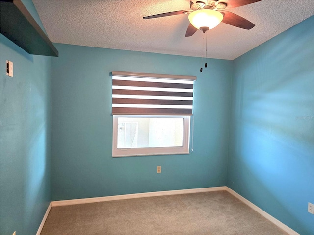 7201 29th Avenue Dr W Unit 306, Bradenton, FL 34209 - carpeted empty room featuring a textured ceiling, a ceiling fan, and baseboards