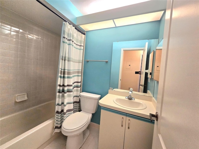 7201 29th Avenue Dr W Unit 306, Bradenton, FL 34209 - bathroom featuring toilet, shower / tub combo with curtain, vanity, tile patterned flooring, and baseboards