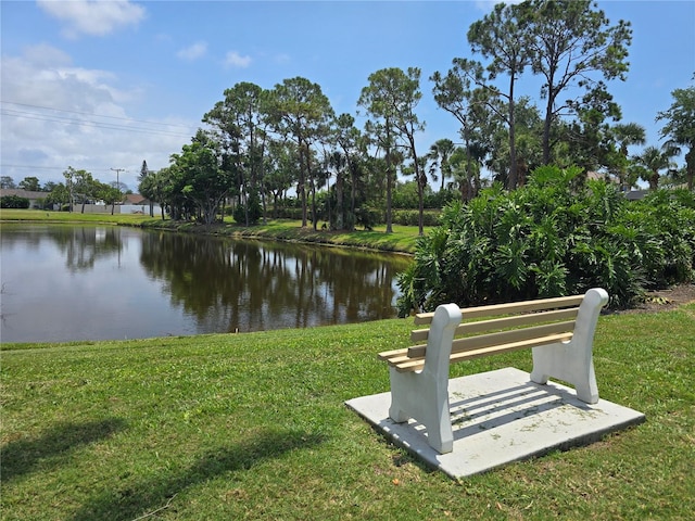 7201 29th Avenue Dr W Unit 306, Bradenton, FL 34209 - view of community with a water view and a lawn