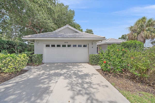 1432 Colony Pl, Venice, FL 34292 - ranch-style home with driveway, stucco siding, and a garage