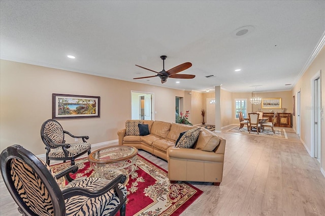 1432 Colony Pl, Venice, FL 34292 - living area with ornamental molding, light wood-style flooring, recessed lighting, a ceiling fan, and baseboards