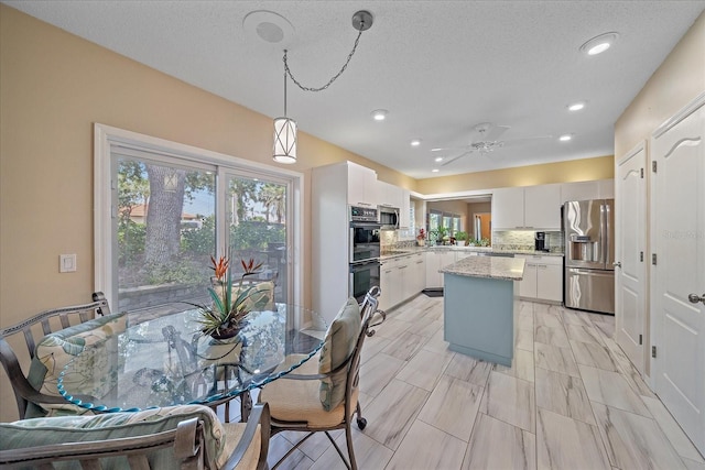1432 Colony Pl, Venice, FL 34292 - dining area with healthy amount of natural light, recessed lighting, and a ceiling fan