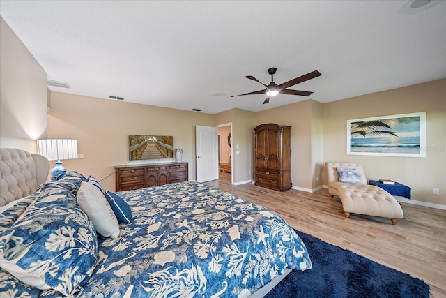 1432 Colony Pl, Venice, FL 34292 - bedroom with wood finished floors, baseboards, and a ceiling fan
