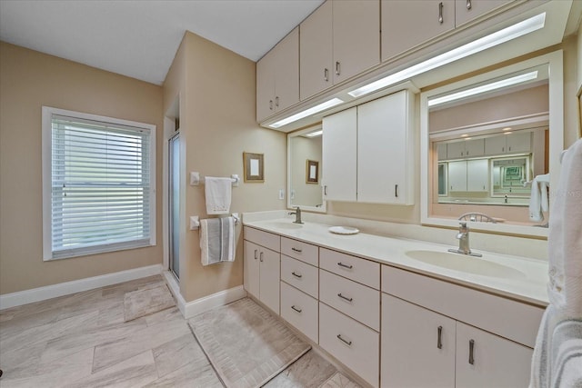 1432 Colony Pl, Venice, FL 34292 - full bathroom featuring baseboards, a stall shower, and double vanity