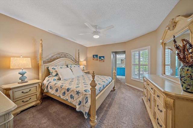 1432 Colony Pl, Venice, FL 34292 - bedroom featuring dark carpet, a textured ceiling, and ceiling fan